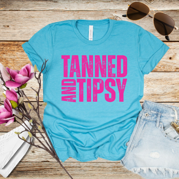 Tanned and Tipsy T-Shirt β Funny Summer Graphic Tee for Beach Days, Lake Life & Vacay Vibes