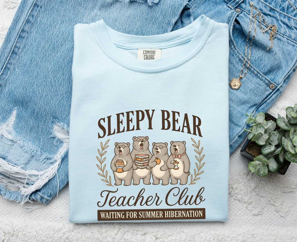 Sleepy Bear Teacher Club Text with an Iage of 4 Yawning Bears, and a humorous statement Waiting for Summer  Hibernation. The image shows the light blue Chambray color. 