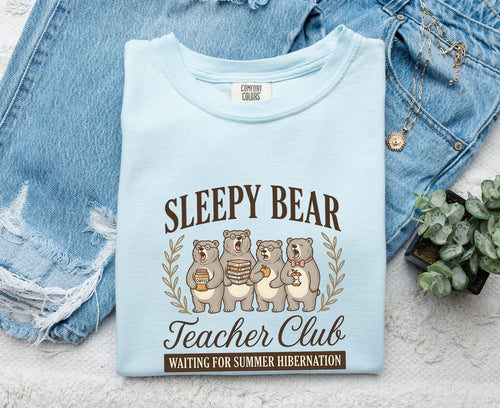 Sleepy Bear Teacher Club Text with an Iage of 4 Yawning Bears, and a humorous statement Waiting for Summer  Hibernation. The image shows the light blue Chambray color. 