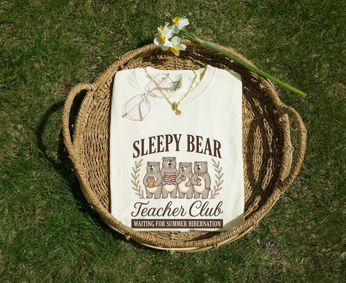 Sleepy Bear Teacher Club Text with an Iage of 4 Yawning Bears, and a humorous statement Waiting for Summer  Hibernation. The image shows the white color t-shirt. 