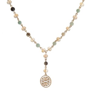 Gold tone, Y necklace with natural stone beads and a boho pendant.