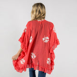 Coral Ruffled kimono with floral details.