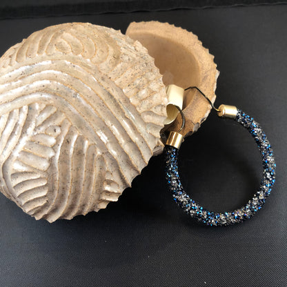Fashionable Adjustable bracelet with druzy style stones.