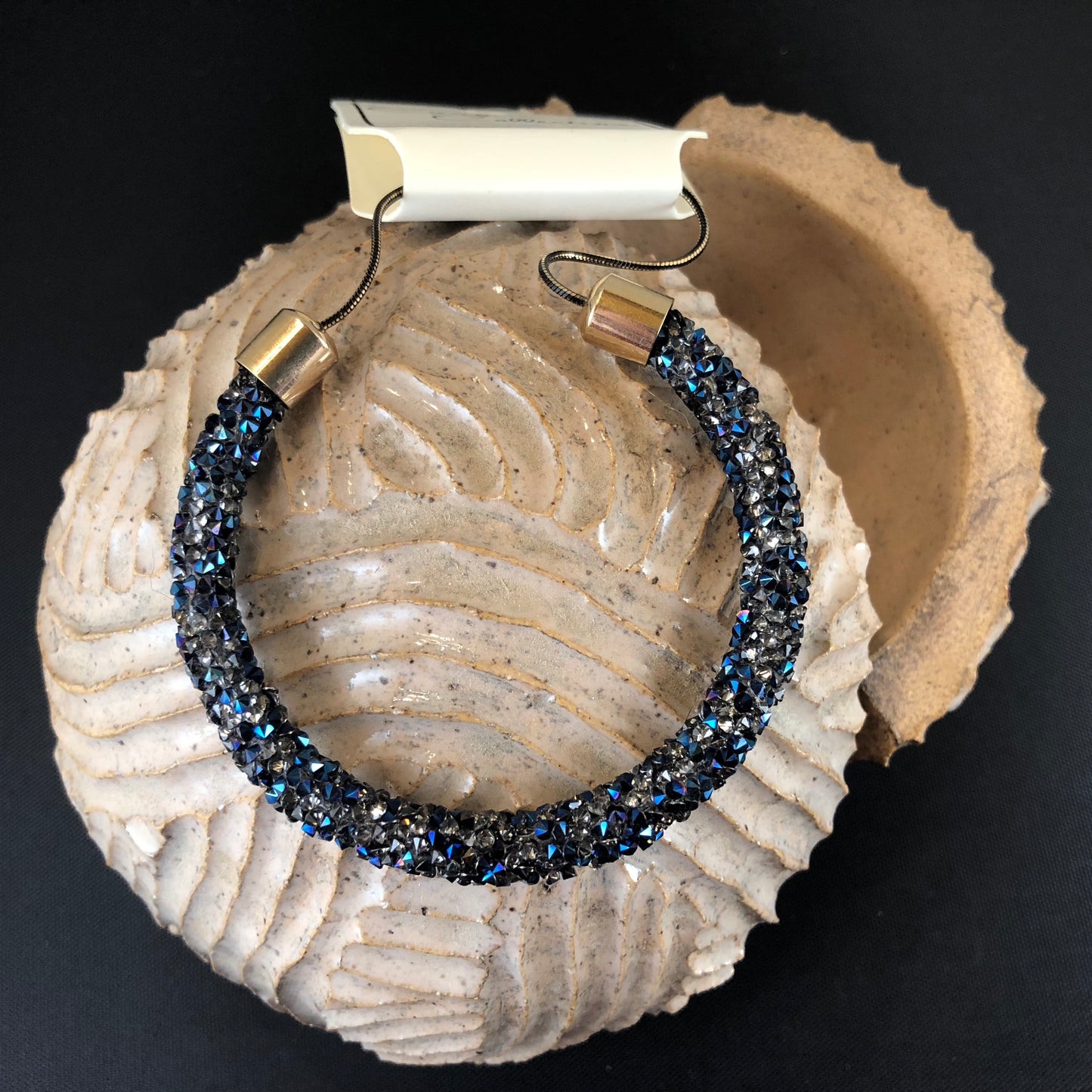 Fashionable Adjustable bracelet with druzy style stones.