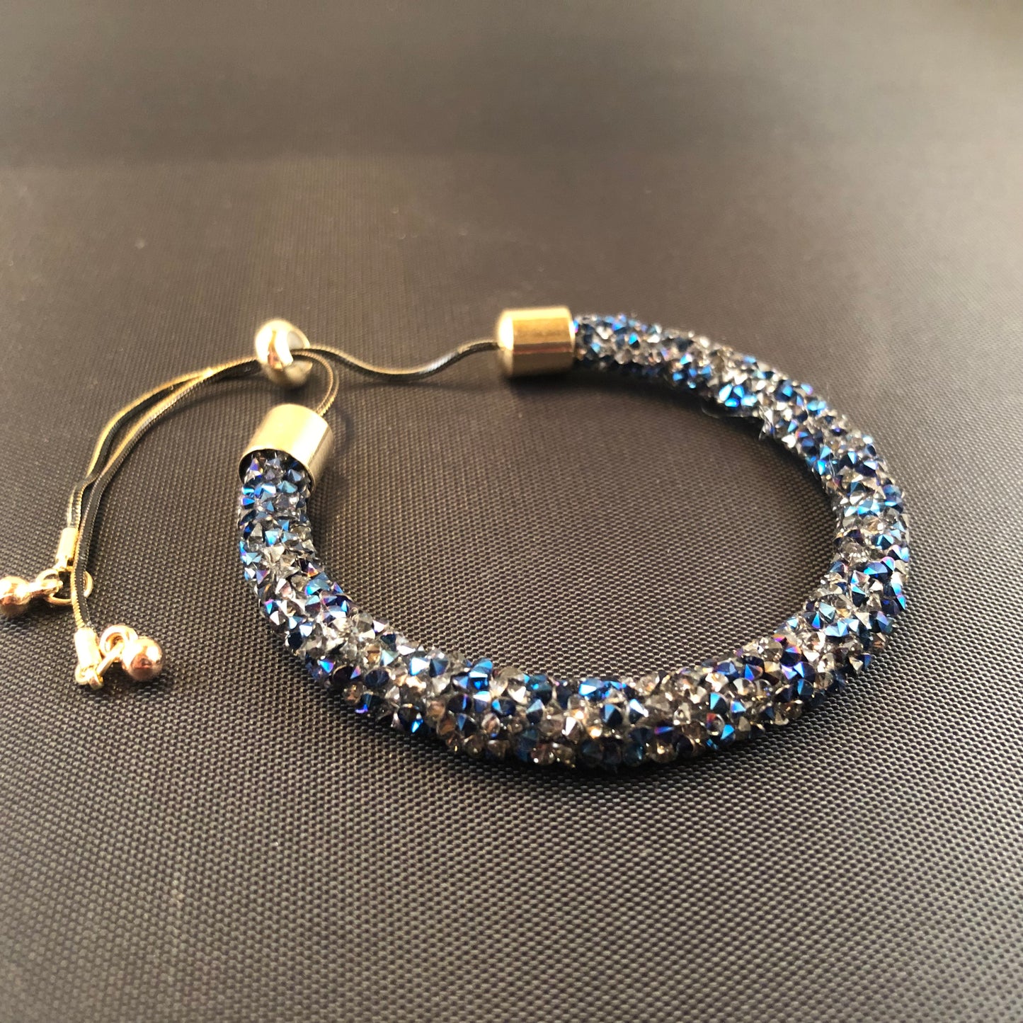 Fashionable Adjustable bracelet with druzy style stones.