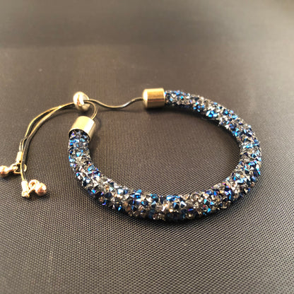 Fashionable Adjustable bracelet with druzy style stones.