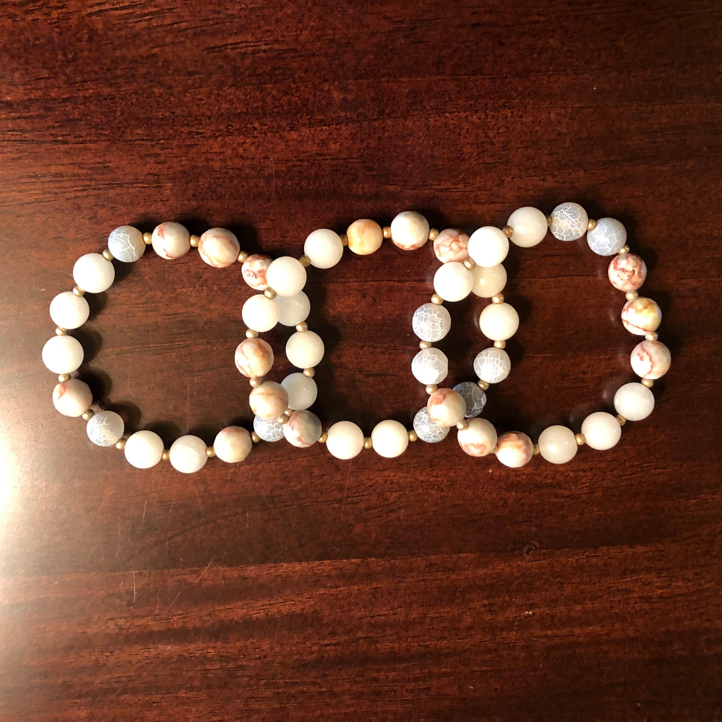 Three bracelet set with natural stone and crackle beads.